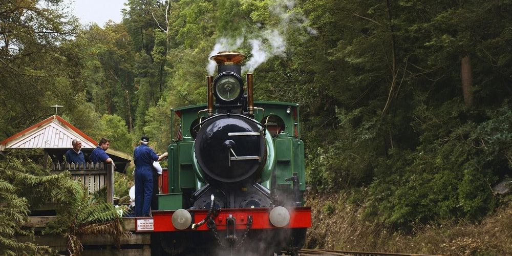 Steam locomotive travelling through the forest on the West Coast Wilderness Railway in Tasmania